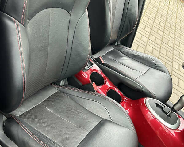 Червоний Ніссан Жук, об'ємом двигуна 1.62 л та пробігом 68 тис. км за 9750 $, фото 24 на Automoto.ua