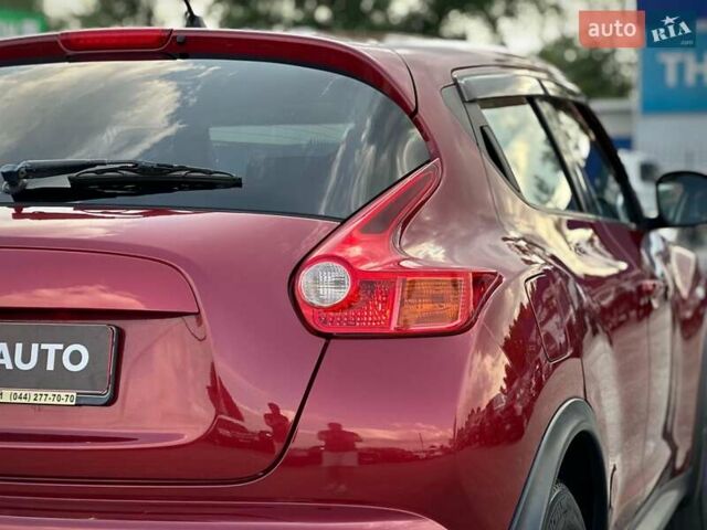 Червоний Ніссан Жук, об'ємом двигуна 1.6 л та пробігом 124 тис. км за 10200 $, фото 16 на Automoto.ua