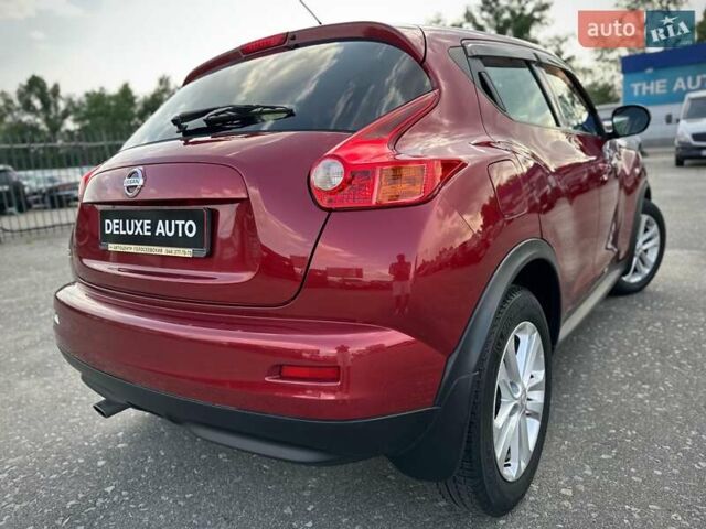 Червоний Ніссан Жук, об'ємом двигуна 1.6 л та пробігом 124 тис. км за 10200 $, фото 22 на Automoto.ua