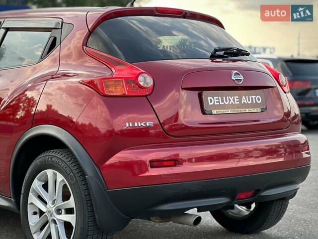 Червоний Ніссан Жук, об'ємом двигуна 1.6 л та пробігом 124 тис. км за 10200 $, фото 18 на Automoto.ua
