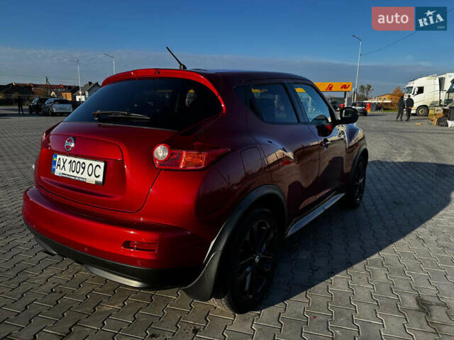 Красный Ниссан Жук, объемом двигателя 1.6 л и пробегом 119 тыс. км за 11700 $, фото 5 на Automoto.ua