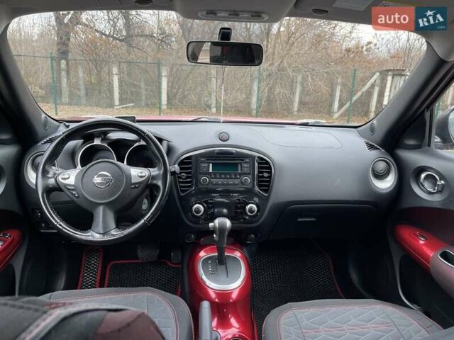 Красный Ниссан Жук, объемом двигателя 1.6 л и пробегом 144 тыс. км за 8900 $, фото 8 на Automoto.ua