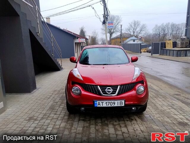 Красный Ниссан Жук, объемом двигателя 1.6 л и пробегом 134 тыс. км за 9600 $, фото 1 на Automoto.ua