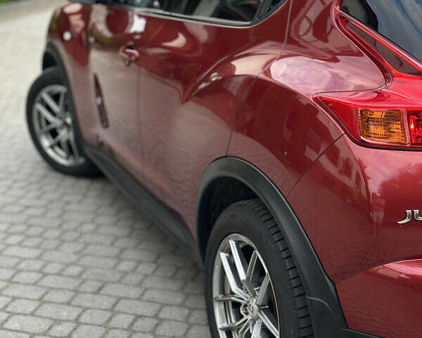 Червоний Ніссан Жук, об'ємом двигуна 1.6 л та пробігом 151 тис. км за 10000 $, фото 7 на Automoto.ua