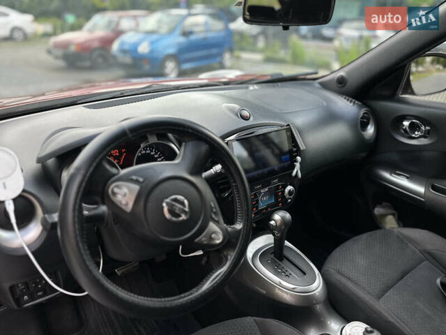 Червоний Ніссан Жук, об'ємом двигуна 1.6 л та пробігом 151 тис. км за 10000 $, фото 23 на Automoto.ua