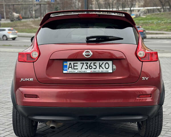 Червоний Ніссан Жук, об'ємом двигуна 1.6 л та пробігом 145 тис. км за 7700 $, фото 3 на Automoto.ua