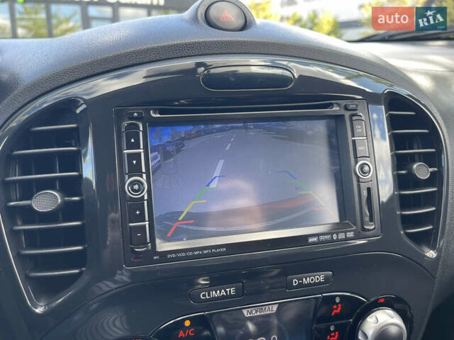 Красный Ниссан Жук, объемом двигателя 1.6 л и пробегом 91 тыс. км за 11500 $, фото 22 на Automoto.ua