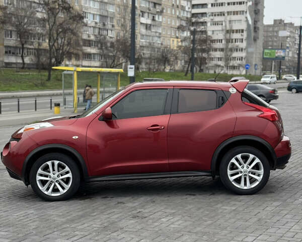 Червоний Ніссан Жук, об'ємом двигуна 1.6 л та пробігом 145 тис. км за 7700 $, фото 1 на Automoto.ua