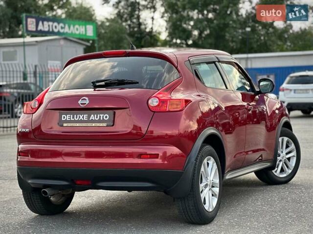 Червоний Ніссан Жук, об'ємом двигуна 1.6 л та пробігом 124 тис. км за 10200 $, фото 23 на Automoto.ua