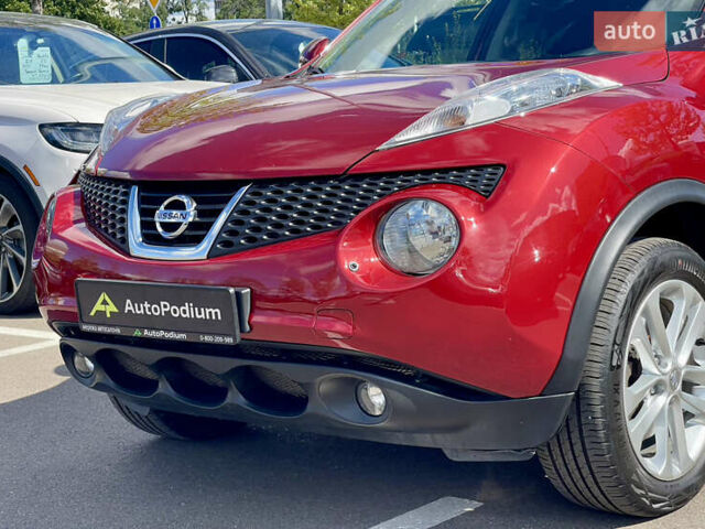 Красный Ниссан Жук, объемом двигателя 1.6 л и пробегом 91 тыс. км за 11500 $, фото 4 на Automoto.ua