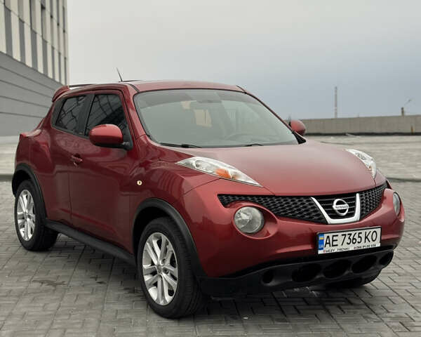 Червоний Ніссан Жук, об'ємом двигуна 1.6 л та пробігом 145 тис. км за 7700 $, фото 6 на Automoto.ua