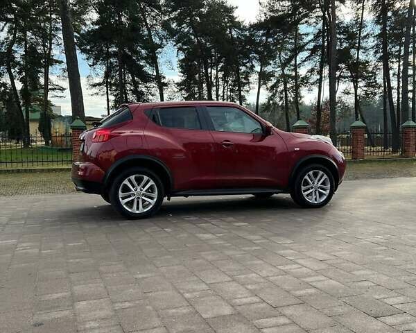 Красный Ниссан Жук, объемом двигателя 1.6 л и пробегом 160 тыс. км за 9797 $, фото 10 на Automoto.ua