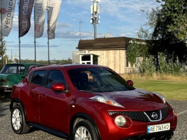 Красный Ниссан Жук, объемом двигателя 1.6 л и пробегом 90 тыс. км за 7999 $, фото 2 на Automoto.ua