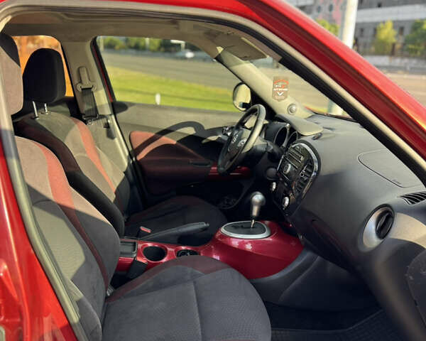 Красный Ниссан Жук, объемом двигателя 1.6 л и пробегом 144 тыс. км за 7899 $, фото 8 на Automoto.ua