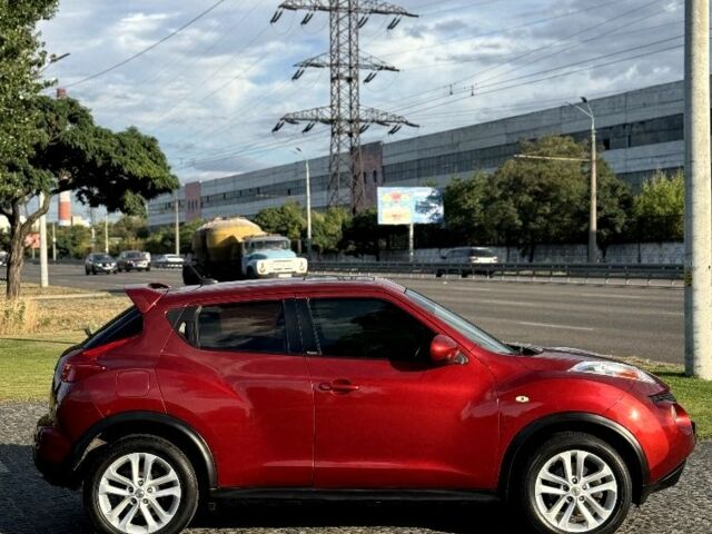 Красный Ниссан Жук, объемом двигателя 1.6 л и пробегом 90 тыс. км за 7999 $, фото 3 на Automoto.ua