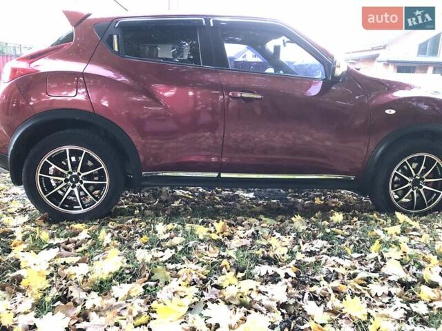 Красный Ниссан Жук, объемом двигателя 1.62 л и пробегом 131 тыс. км за 9900 $, фото 5 на Automoto.ua