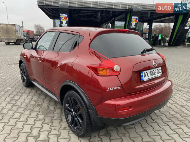 Красный Ниссан Жук, объемом двигателя 1.6 л и пробегом 119 тыс. км за 11000 $, фото 4 на Automoto.ua