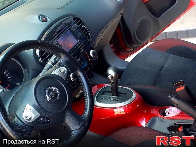 Красный Ниссан Жук, объемом двигателя 1.6 л и пробегом 117 тыс. км за 11100 $, фото 2 на Automoto.ua