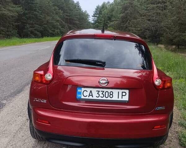 Красный Ниссан Жук, объемом двигателя 1.46 л и пробегом 192 тыс. км за 10300 $, фото 2 на Automoto.ua