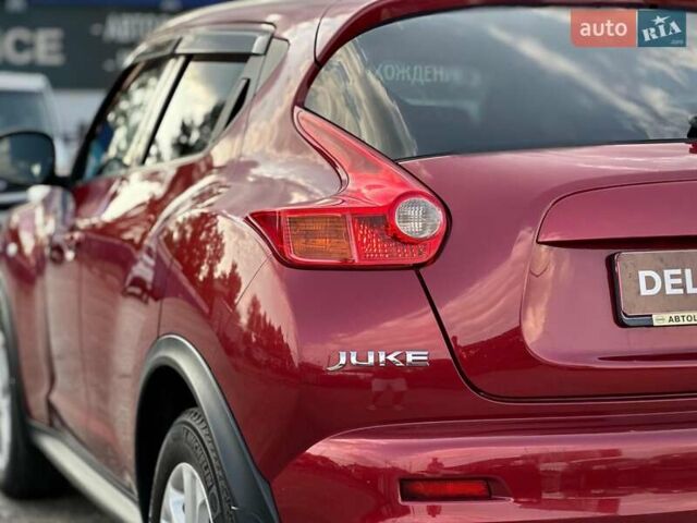 Червоний Ніссан Жук, об'ємом двигуна 1.6 л та пробігом 124 тис. км за 10200 $, фото 15 на Automoto.ua