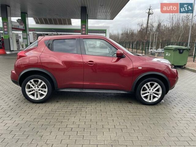 Красный Ниссан Жук, объемом двигателя 1.6 л и пробегом 144 тыс. км за 8900 $, фото 2 на Automoto.ua