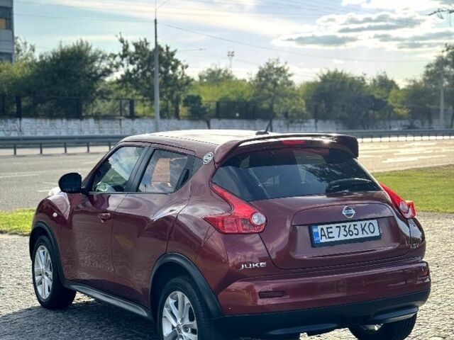 Красный Ниссан Жук, объемом двигателя 1.6 л и пробегом 90 тыс. км за 7999 $, фото 6 на Automoto.ua