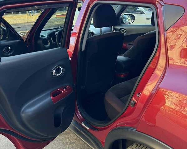 Красный Ниссан Жук, объемом двигателя 1.6 л и пробегом 123 тыс. км за 9950 $, фото 7 на Automoto.ua