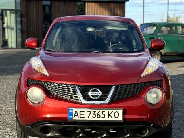 Красный Ниссан Жук, объемом двигателя 1.6 л и пробегом 90 тыс. км за 7999 $, фото 1 на Automoto.ua