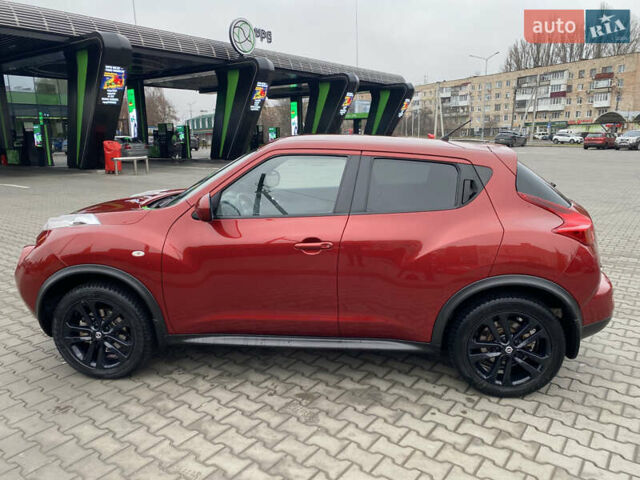 Красный Ниссан Жук, объемом двигателя 1.6 л и пробегом 119 тыс. км за 11000 $, фото 3 на Automoto.ua