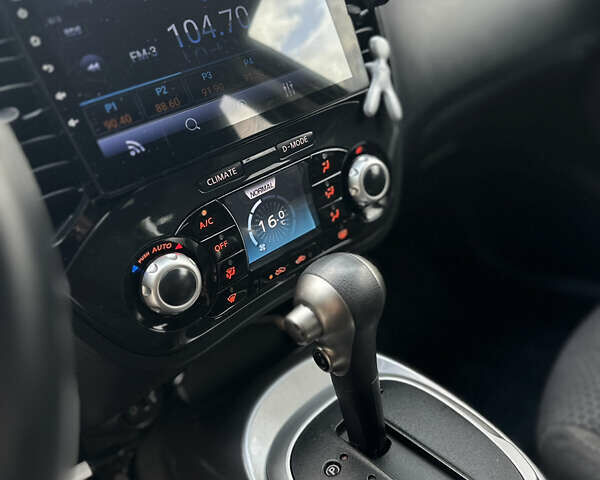 Червоний Ніссан Жук, об'ємом двигуна 1.6 л та пробігом 151 тис. км за 10000 $, фото 22 на Automoto.ua