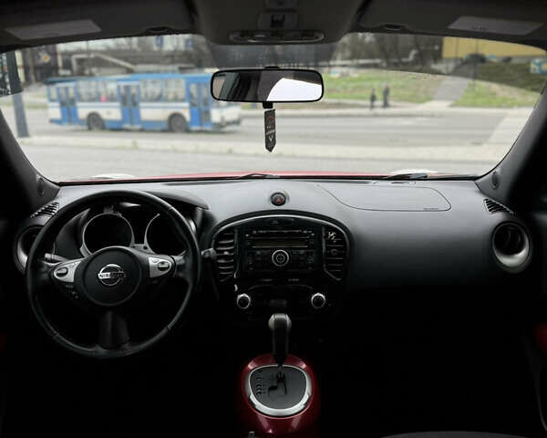 Червоний Ніссан Жук, об'ємом двигуна 1.6 л та пробігом 145 тис. км за 7700 $, фото 13 на Automoto.ua