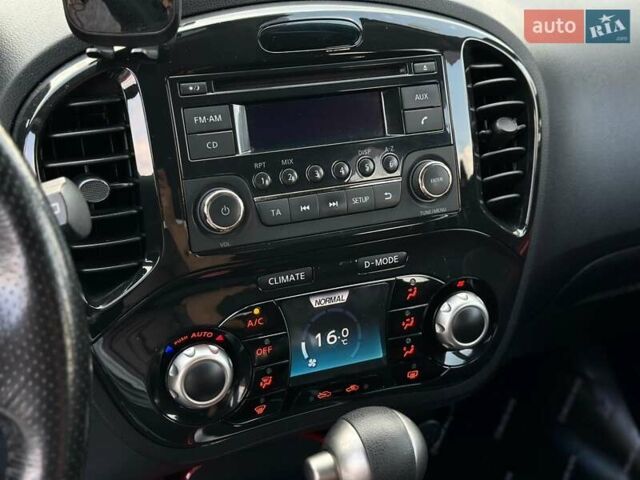 Червоний Ніссан Жук, об'ємом двигуна 1.6 л та пробігом 124 тис. км за 10200 $, фото 32 на Automoto.ua