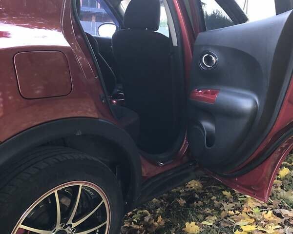 Красный Ниссан Жук, объемом двигателя 1.62 л и пробегом 131 тыс. км за 9900 $, фото 13 на Automoto.ua