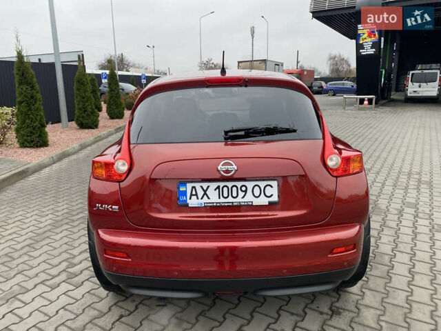 Красный Ниссан Жук, объемом двигателя 1.6 л и пробегом 119 тыс. км за 11000 $, фото 5 на Automoto.ua