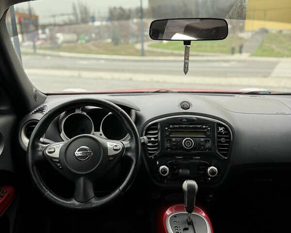 Червоний Ніссан Жук, об'ємом двигуна 1.6 л та пробігом 145 тис. км за 7700 $, фото 12 на Automoto.ua