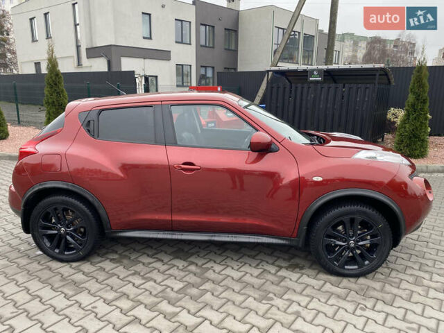 Красный Ниссан Жук, объемом двигателя 1.6 л и пробегом 119 тыс. км за 11000 $, фото 7 на Automoto.ua