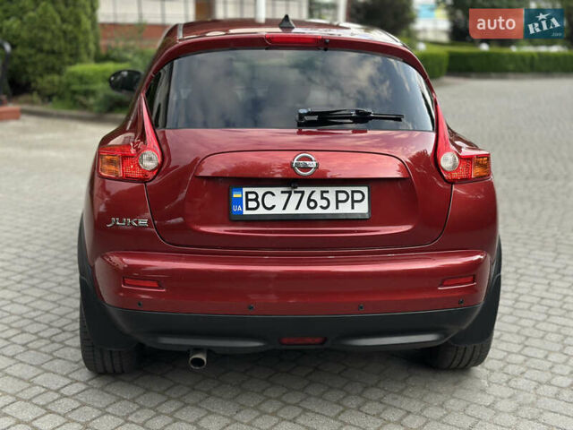 Червоний Ніссан Жук, об'ємом двигуна 1.6 л та пробігом 151 тис. км за 10000 $, фото 4 на Automoto.ua
