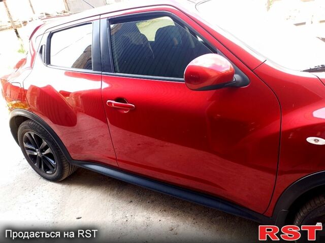 Красный Ниссан Жук, объемом двигателя 1.6 л и пробегом 117 тыс. км за 11100 $, фото 5 на Automoto.ua
