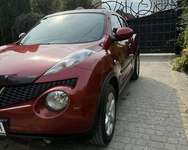 Червоний Ніссан Жук, об'ємом двигуна 1.6 л та пробігом 75 тис. км за 10200 $, фото 6 на Automoto.ua