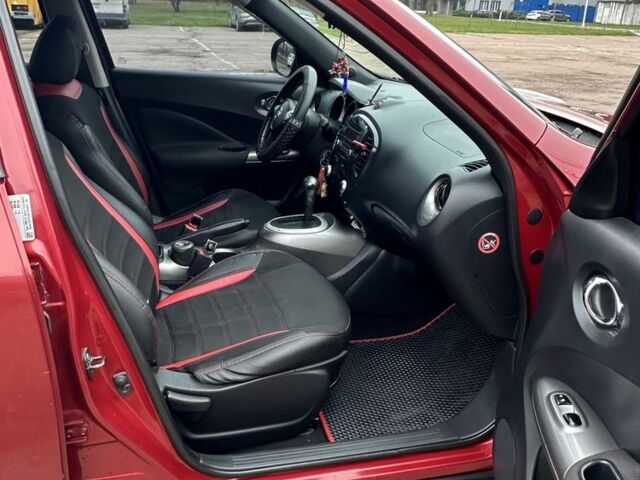 Красный Ниссан Жук, объемом двигателя 1.6 л и пробегом 214 тыс. км за 9000 $, фото 4 на Automoto.ua