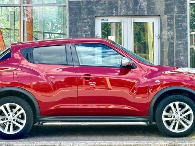 Красный Ниссан Жук, объемом двигателя 1.6 л и пробегом 123 тыс. км за 9000 $, фото 8 на Automoto.ua