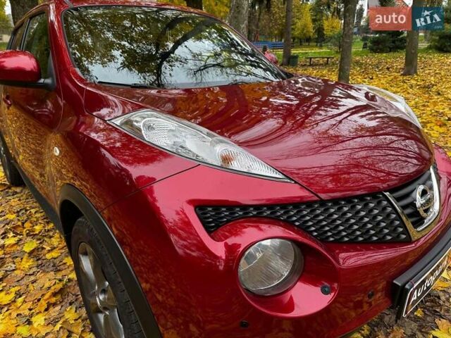 Красный Ниссан Жук, объемом двигателя 1.6 л и пробегом 131 тыс. км за 9990 $, фото 1 на Automoto.ua