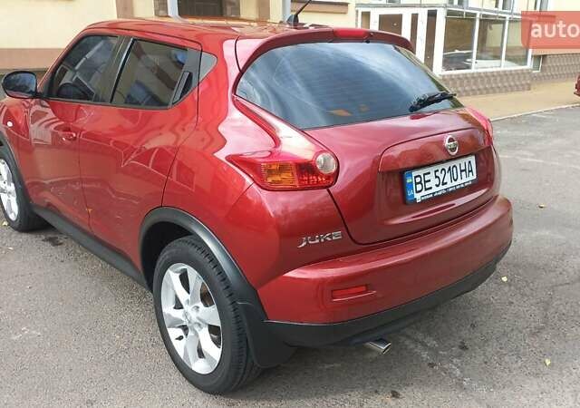 Червоний Ніссан Жук, об'ємом двигуна 1.6 л та пробігом 199 тис. км за 9700 $, фото 4 на Automoto.ua