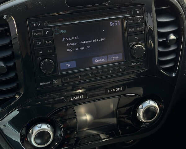 Червоний Ніссан Жук, об'ємом двигуна 1.6 л та пробігом 139 тис. км за 10000 $, фото 7 на Automoto.ua