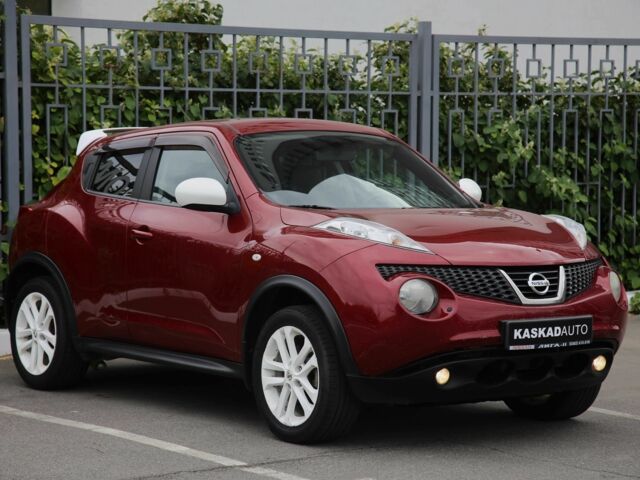 Красный Ниссан Жук, объемом двигателя 1.6 л и пробегом 154 тыс. км за 9700 $, фото 2 на Automoto.ua