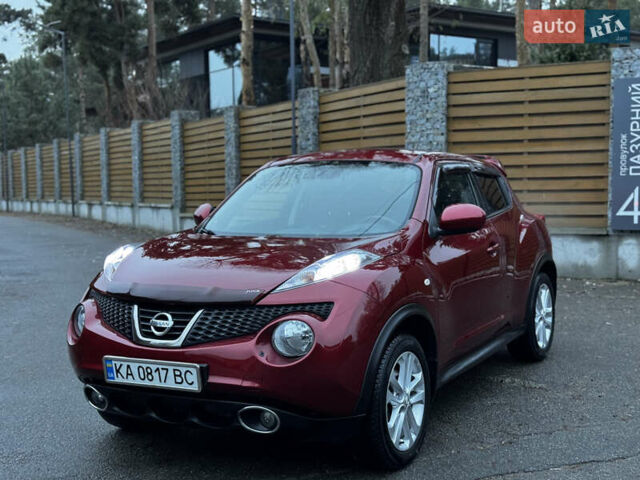 Червоний Ніссан Жук, об'ємом двигуна 1.6 л та пробігом 97 тис. км за 10750 $, фото 11 на Automoto.ua