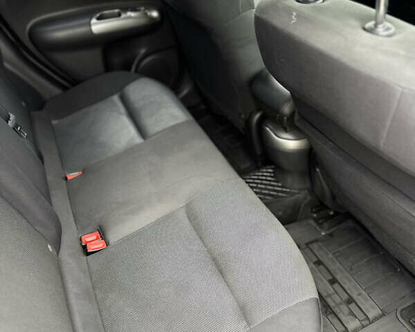 Красный Ниссан Жук, объемом двигателя 1.6 л и пробегом 130 тыс. км за 9999 $, фото 19 на Automoto.ua