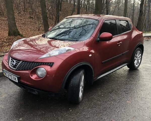 Червоний Ніссан Жук, об'ємом двигуна 1.6 л та пробігом 178 тис. км за 9000 $, фото 3 на Automoto.ua