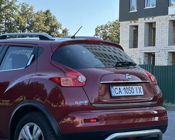 Красный Ниссан Жук, объемом двигателя 1.6 л и пробегом 198 тыс. км за 8300 $, фото 12 на Automoto.ua
