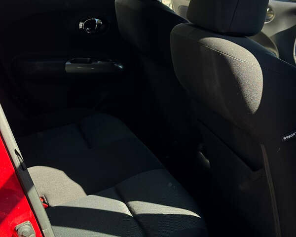 Червоний Ніссан Жук, об'ємом двигуна 1.6 л та пробігом 139 тис. км за 10000 $, фото 11 на Automoto.ua